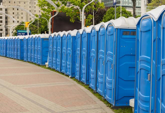 a row of portable restrooms at a fairground, offering visitors a clean and hassle-free experience in alliance